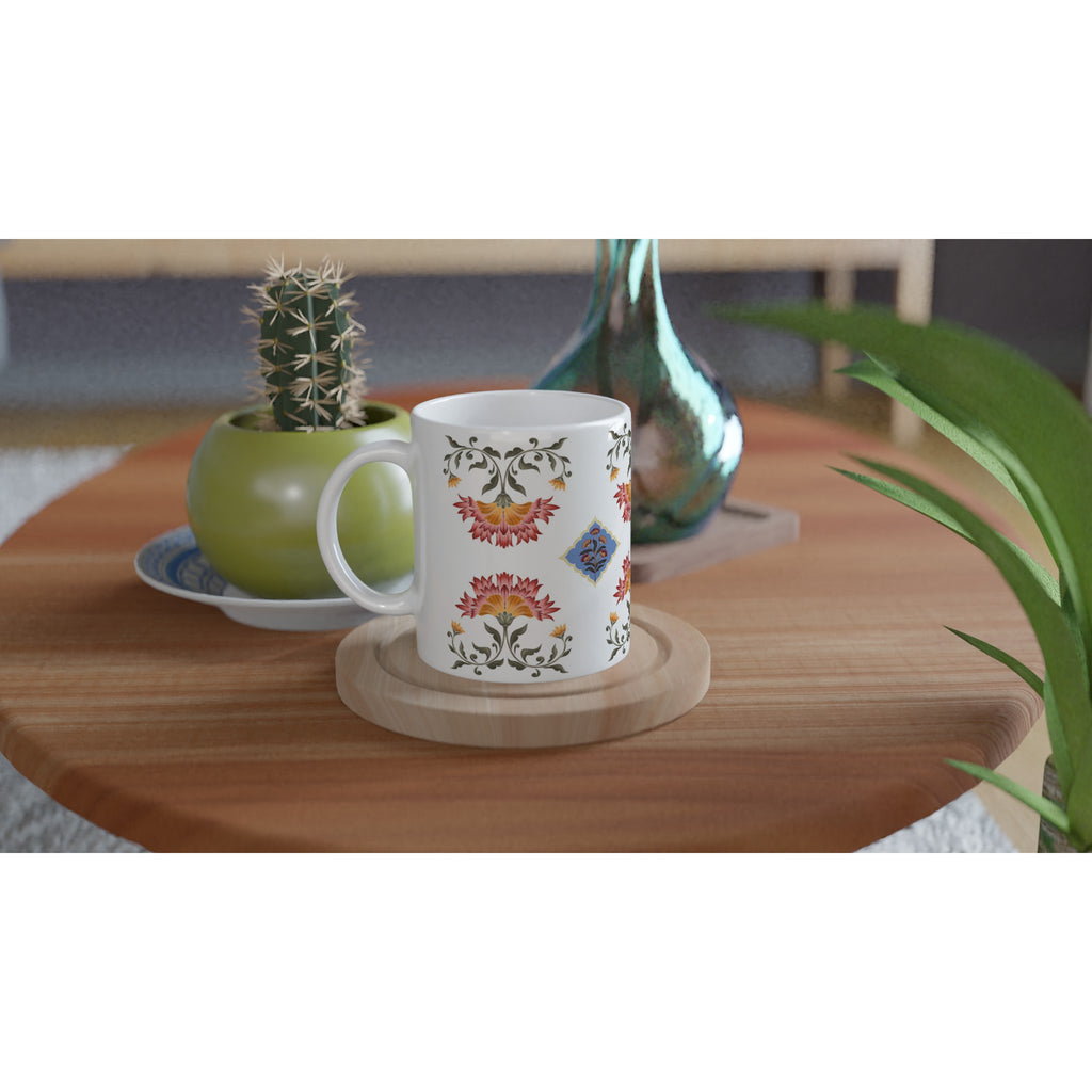 Designer 1 Ceramic Mug with Mughal floral print on a table