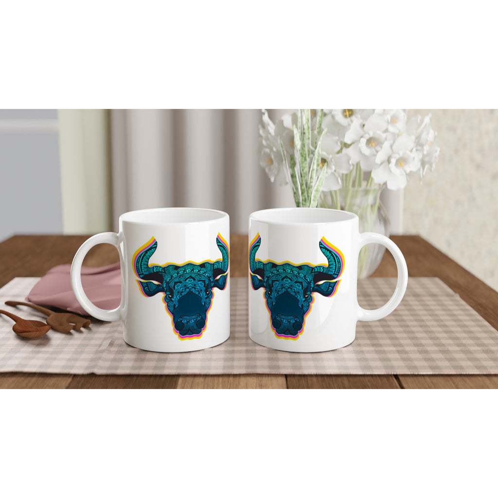 Image of two coffee white coffee mugs with Taurus Sign designed by AK Pattern Studio 