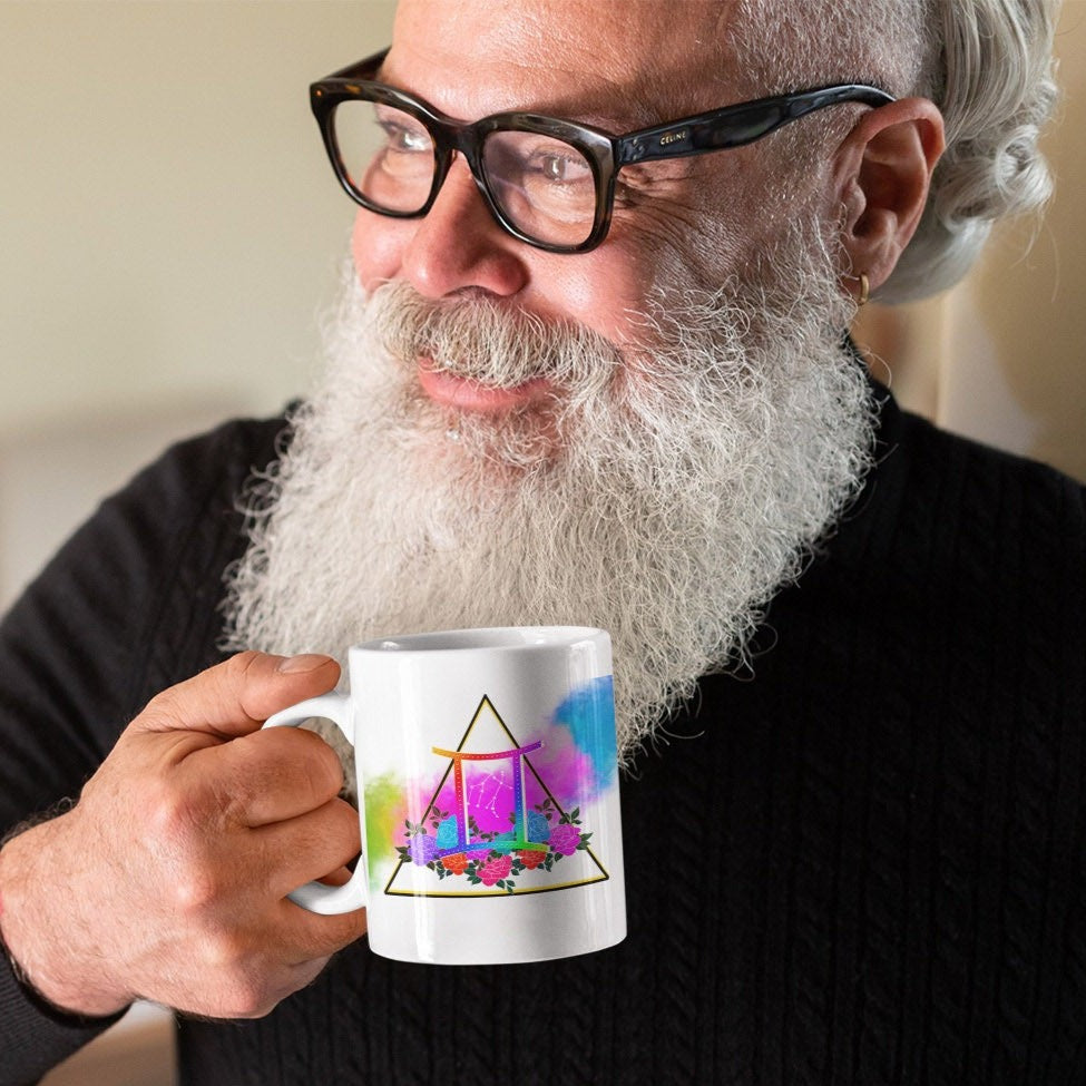 Image of Model holding Coffee Mug with Gemini Sign designed by AK Pattern Studio