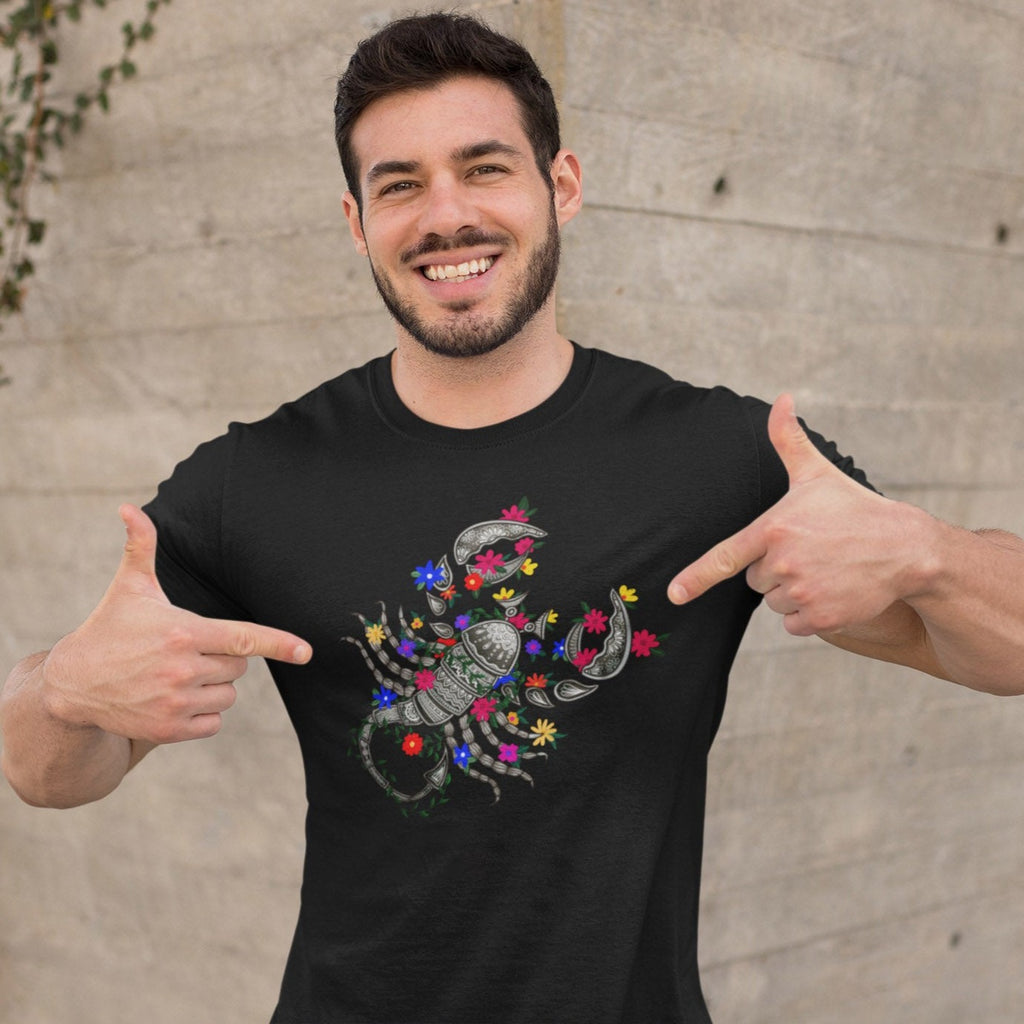 Man Wearing Black Graphic Tee with Scorpio Zodiac Sign Graphic by AK Pattern Studio