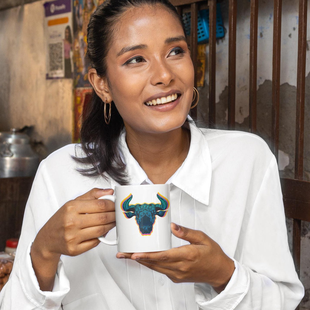 Image of Model holding Coffee Mug with Taurus Sign designed by AK Pattern Studio